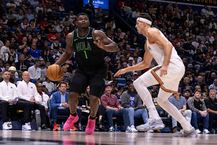 Dec 1, 2023; New Orleans, Louisiana, USA; New Orleans Pelicans forward Zion Williamson (1) drives to the basket against San Antonio Spurs forward Zach Collins (23) during the first half at the Smoothie King Center.